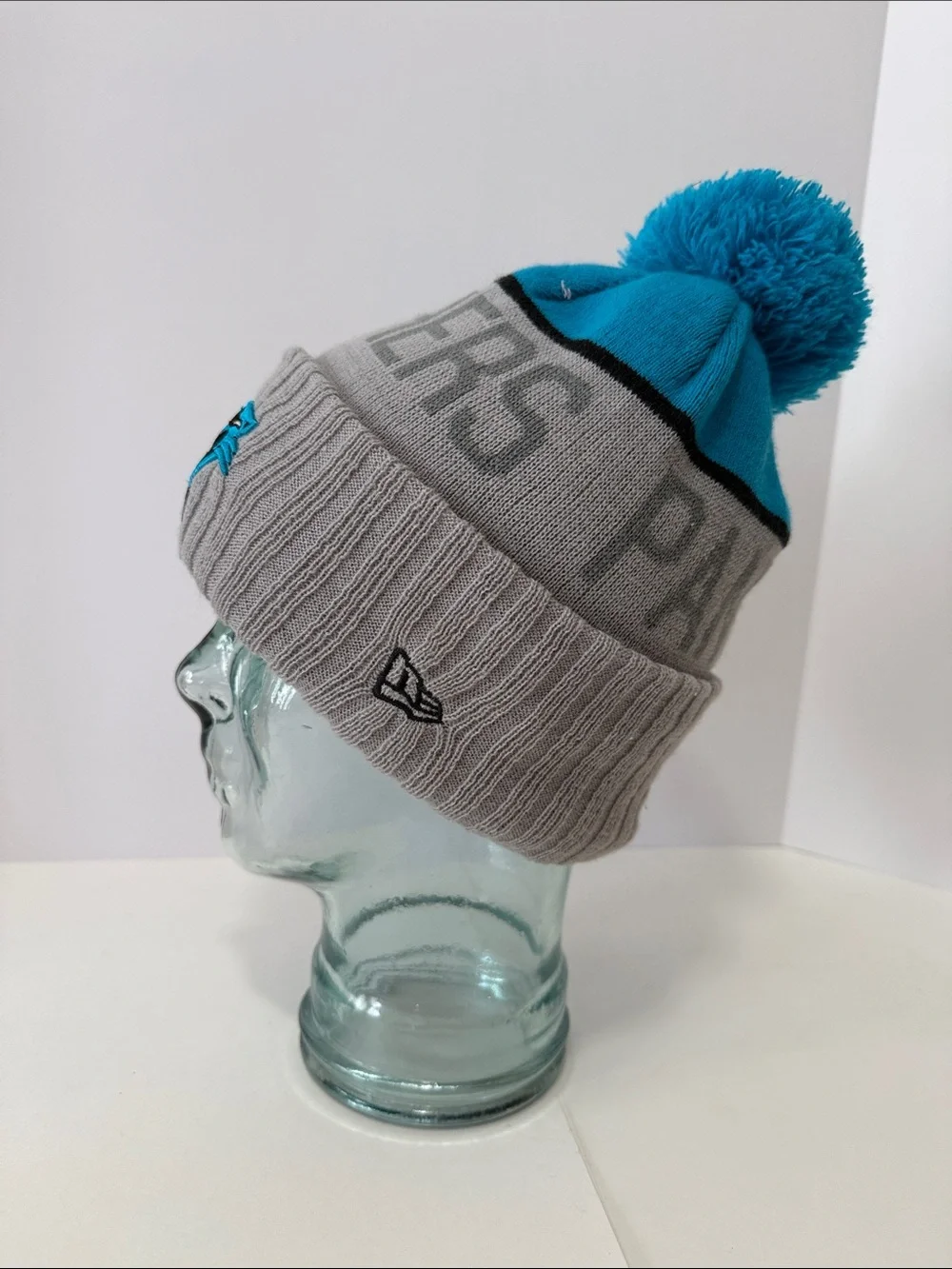 New Era Carolina Panthers NFL Gray and Teal Pom Beanie